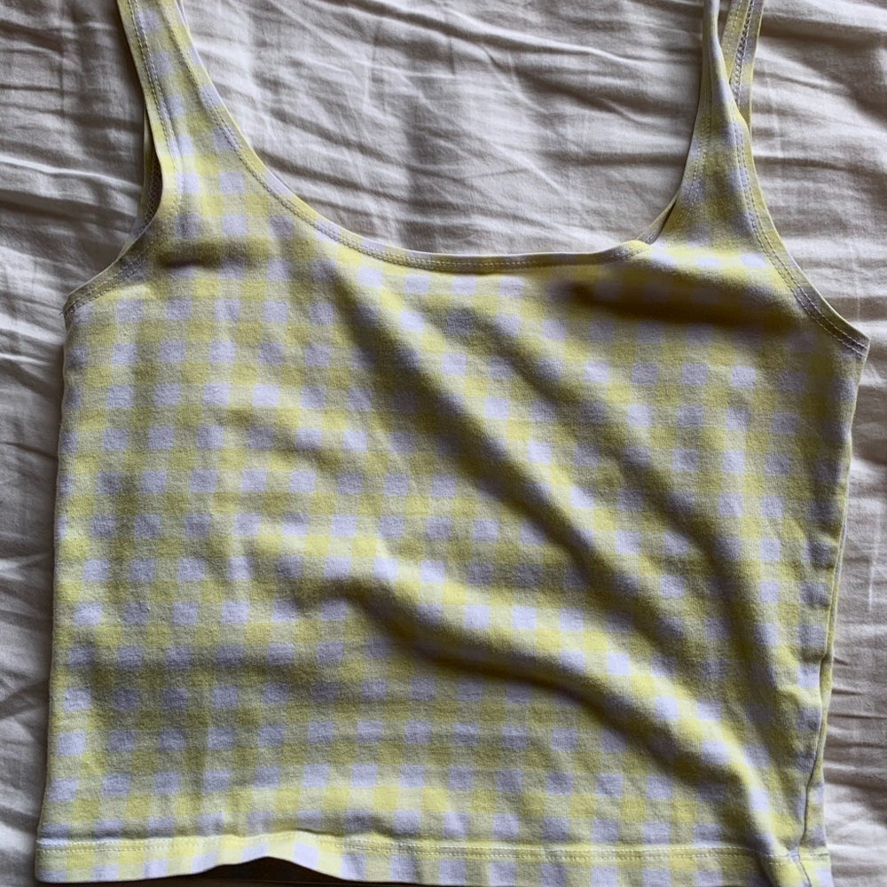 white and yellow checkered tank